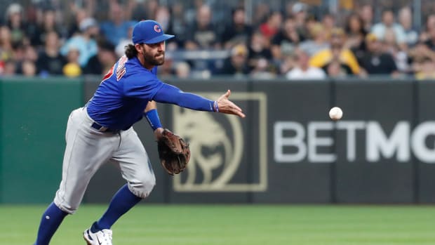 Aug 25, 2023; Pittsburgh, Pennsylvania, USA; Chicago Cubs shortstop Dansby Swanson (7) flips the ball to second base for a force out against the Pittsburgh Pirates during the fourth inning at PNC Park. Mandatory Credit: Charles LeClaire-USA TODAY Sports